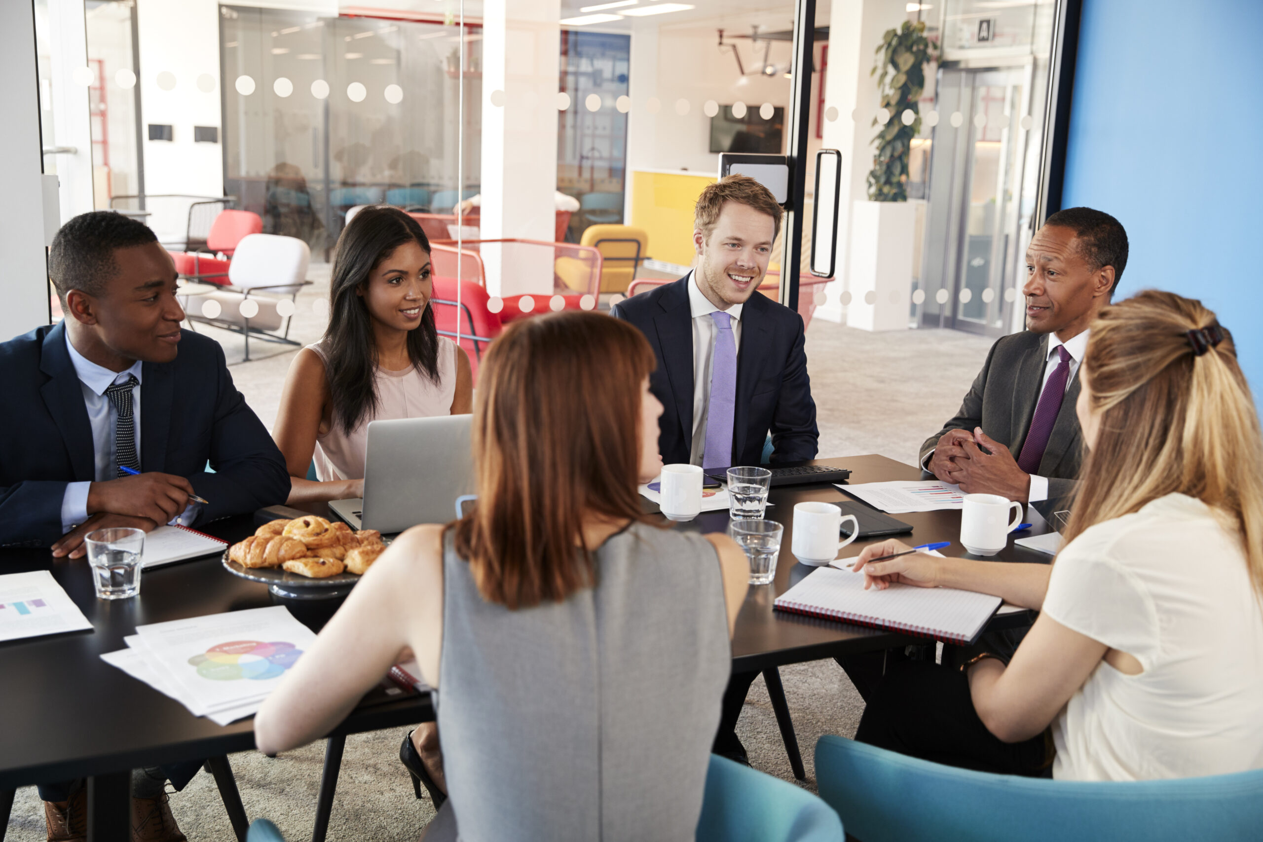 Business colleagues talking in a meeting room