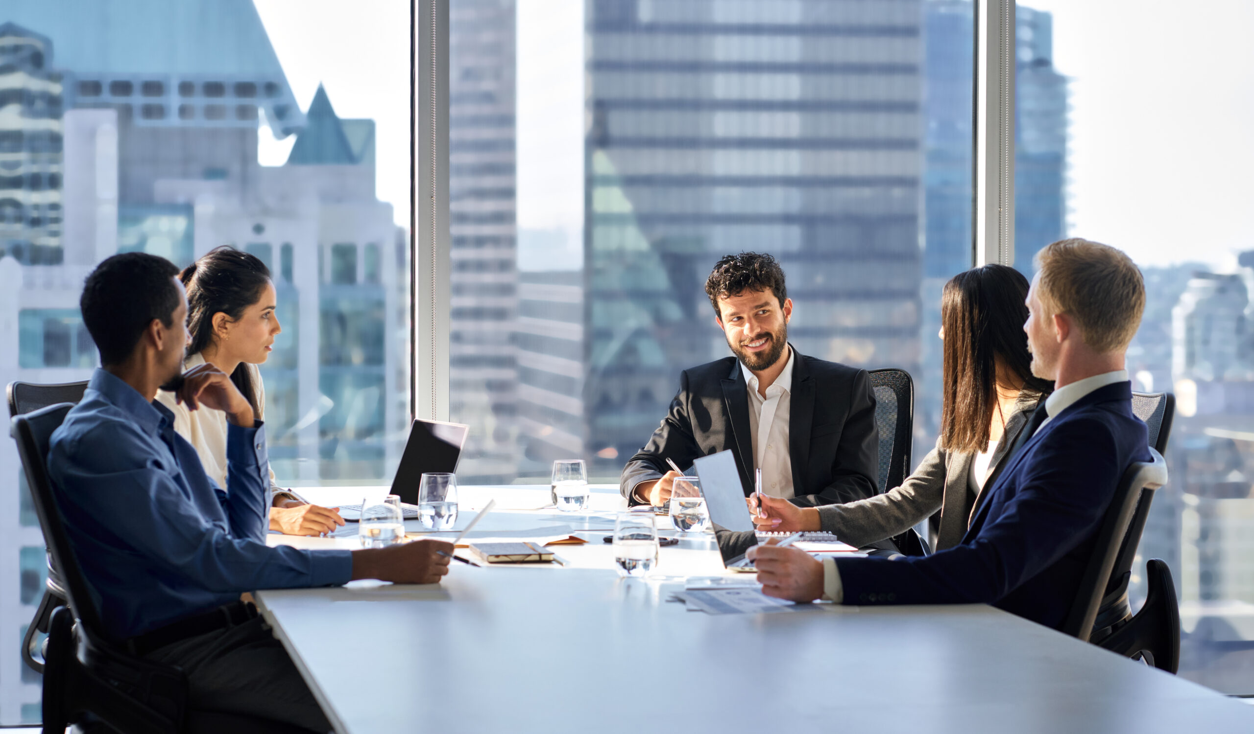 International professional business team people at group meeting table. staff discussing payroll for recruitment agencies in a meeting room